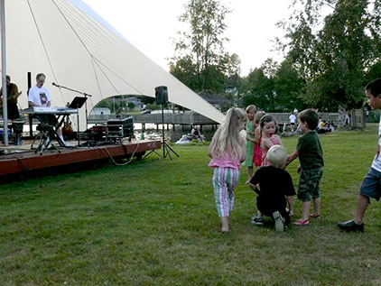 Image of kids in front of the stage